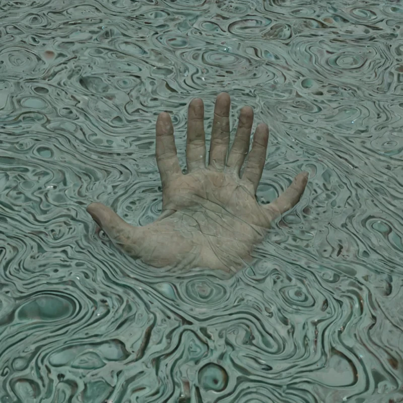 A single, selfrewriting membrane of reversed memory, shaped like a 27,001dimensional skin of unformed recollection and inverted nostalgia, drifts at the center of a vast, inverted lagoon of solidified forgetting. Each ripple is etched from the exact moment between a face being recognized and its refusal to remain in focus, a song echoing in a room and dissolving into nonmelody, a hand reaching across time and collapsing into pure, unmeasured nonpresence. The membrane does not preserve the pastit unpreserves it, each fraying edge shedding a layer of mnemonic potential that never coalesced into identity, emotion, or continuity, reforming into a shimmering, iridescent gel that