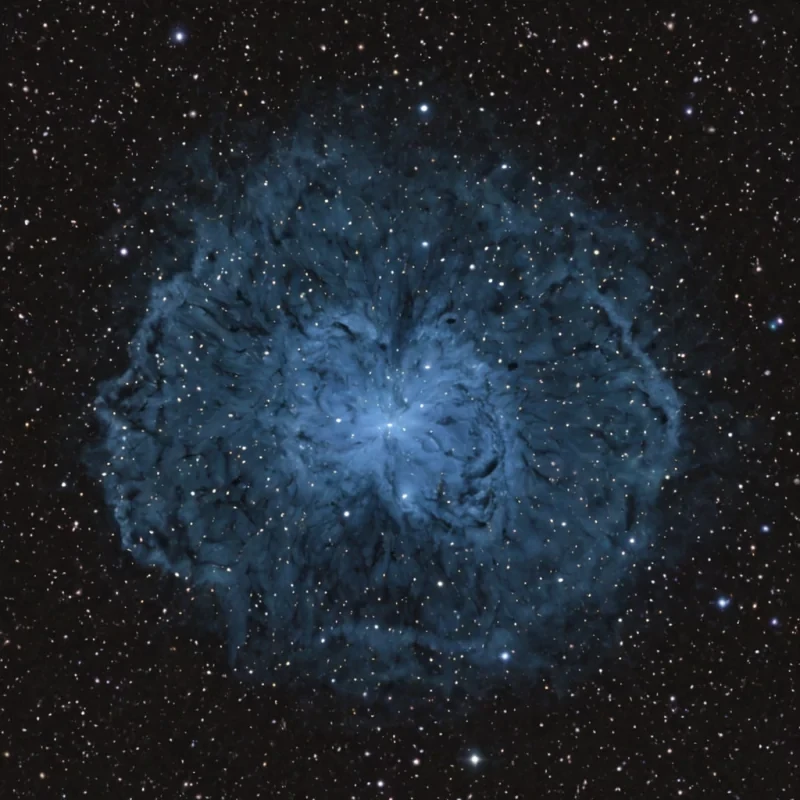 A single, selfreplicating constellation of reversed silence, shaped like a 42,701dimensional nebula of unformed quiet and inverted resonance, drifts at the center of a vast, inverted sky of solidified sound. Each star is forged from the exact moment between a word being spoken and its refusal to echo, a breath held in anticipation and dissolving into nonexpectation, a heartbeat syncing with the void and collapsing into pure, unmeasured nonrhythm. The nebula does not emit lightit unemits it, each fading point shedding a layer of auditory potential that never coalesced into vibration, tone, or meaning, reforming into ephemeral, sapphireveined dust that diss